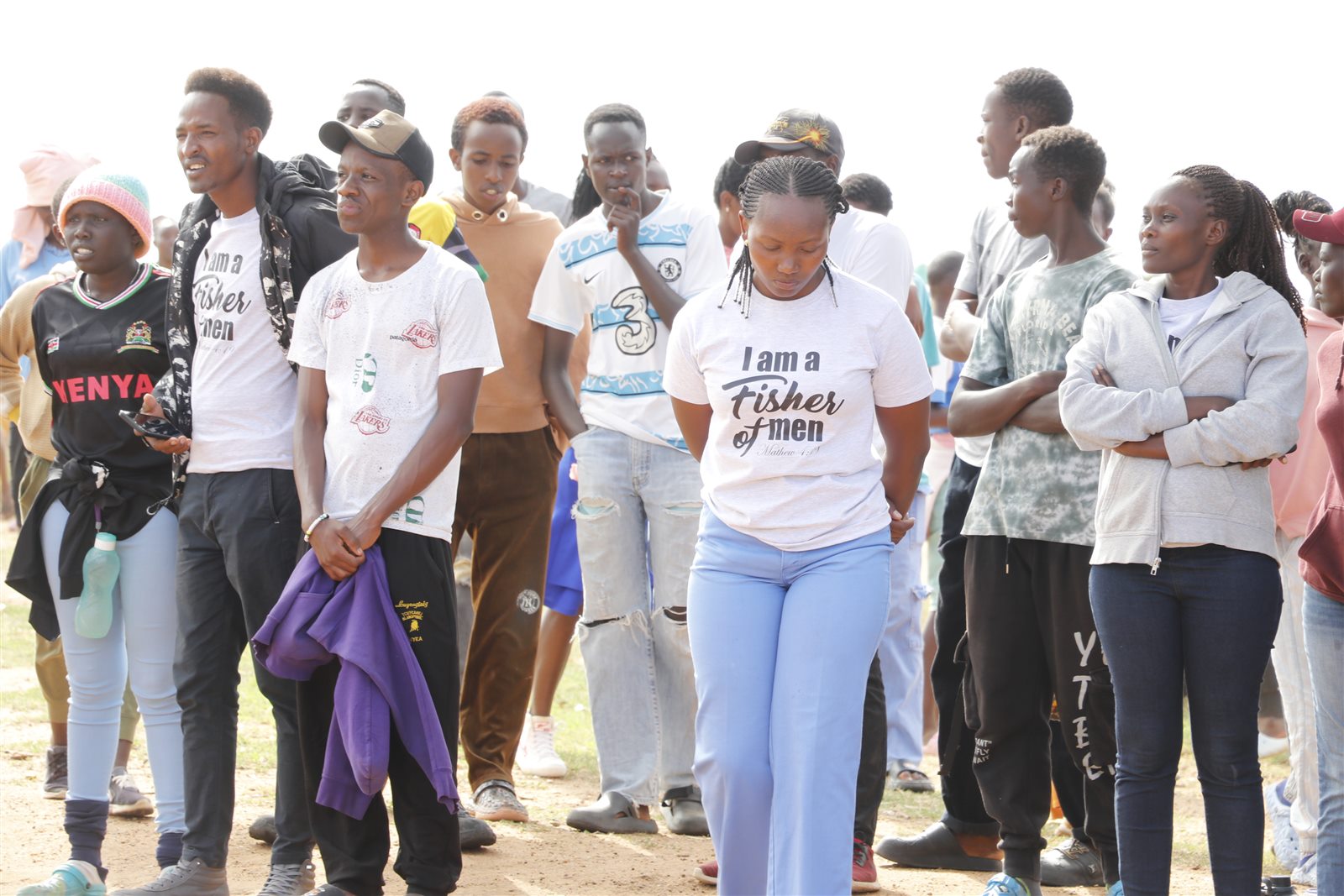 Young people gathered in a reflective moment at Camp Hope